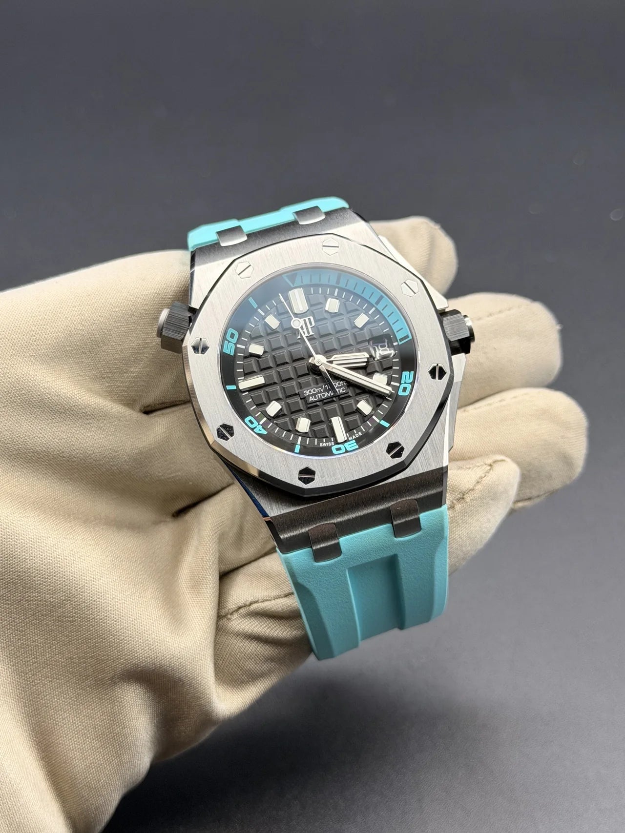 Grey dial chronograph with a turquoise rubber strap
