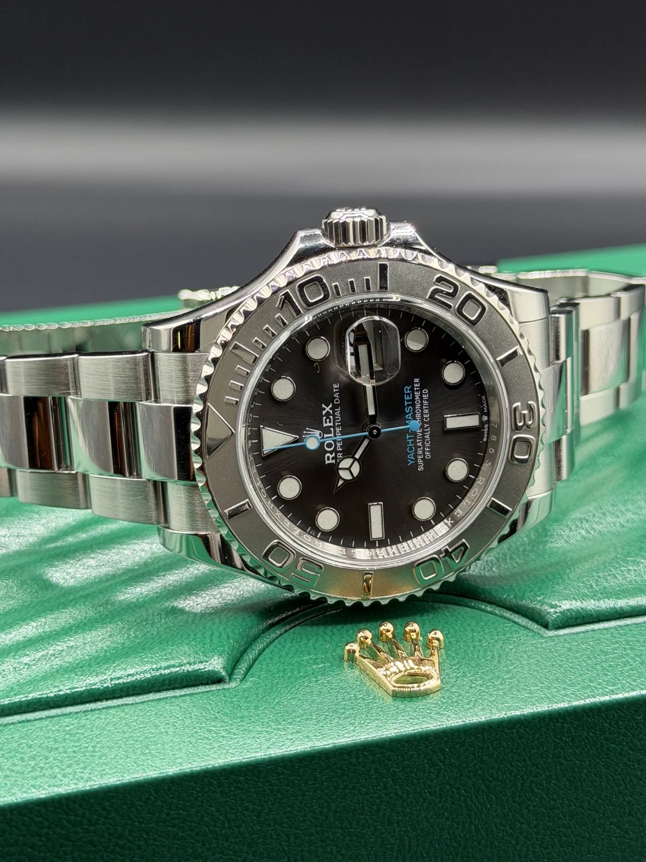 Steel watch with a black dial and two-tone numbered bezel